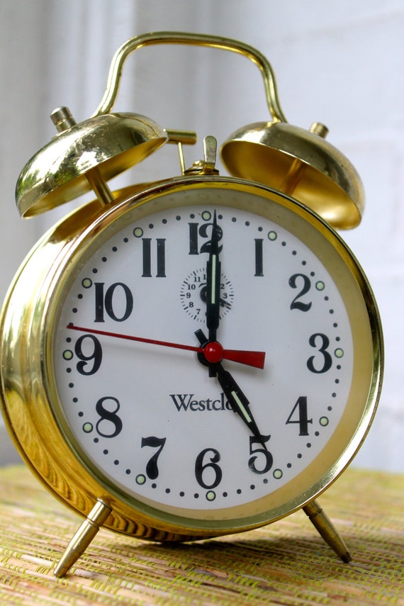 old fashioned alarm clock brass gold