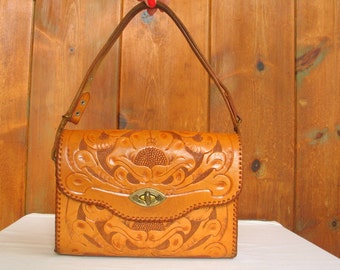Items similar to Vintage Hand Tooled Handbag With Matching Wallet on Etsy