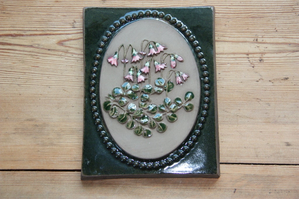 Nice floral wall plaque in ceramic from Sweden