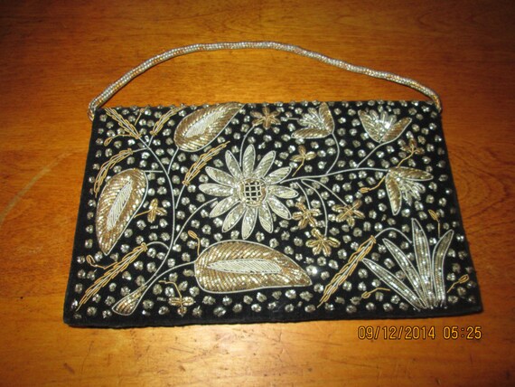 black jewelled clutch bag