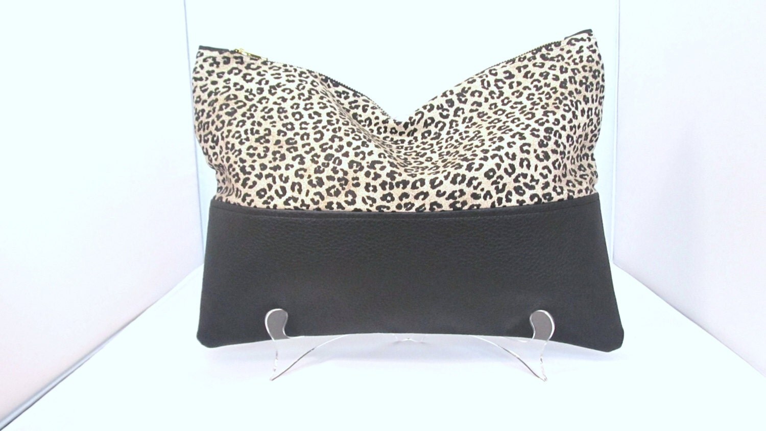 black faux leather clutch bag