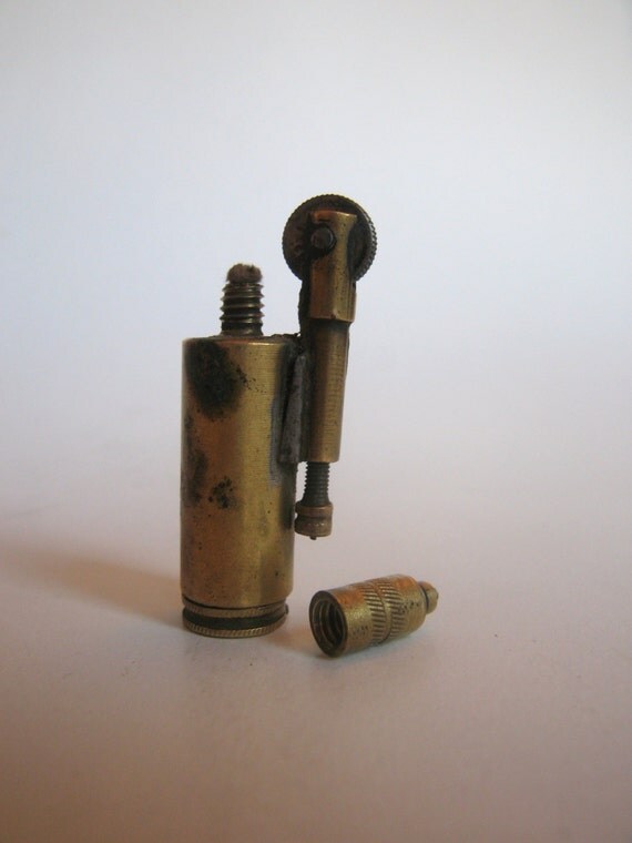 antique brass pocket cigarette lighter