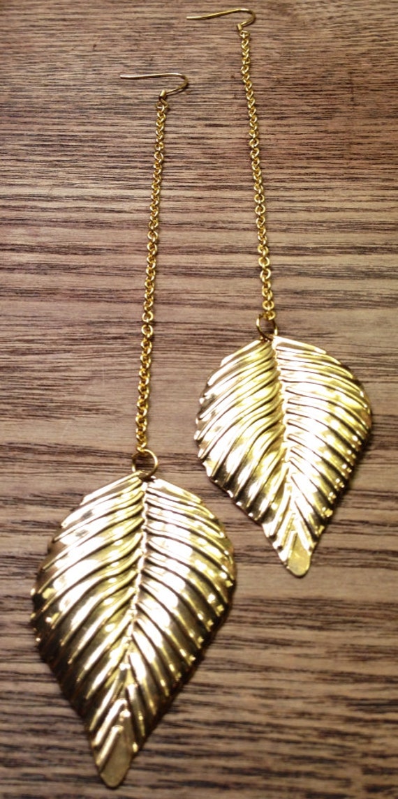 Items similar to Gold Leaf Dangle Earrings on Etsy