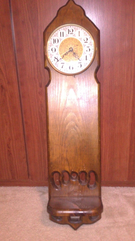 Vintage Long Dark Wooden Wall Hanging Clock by UnexpectingItems