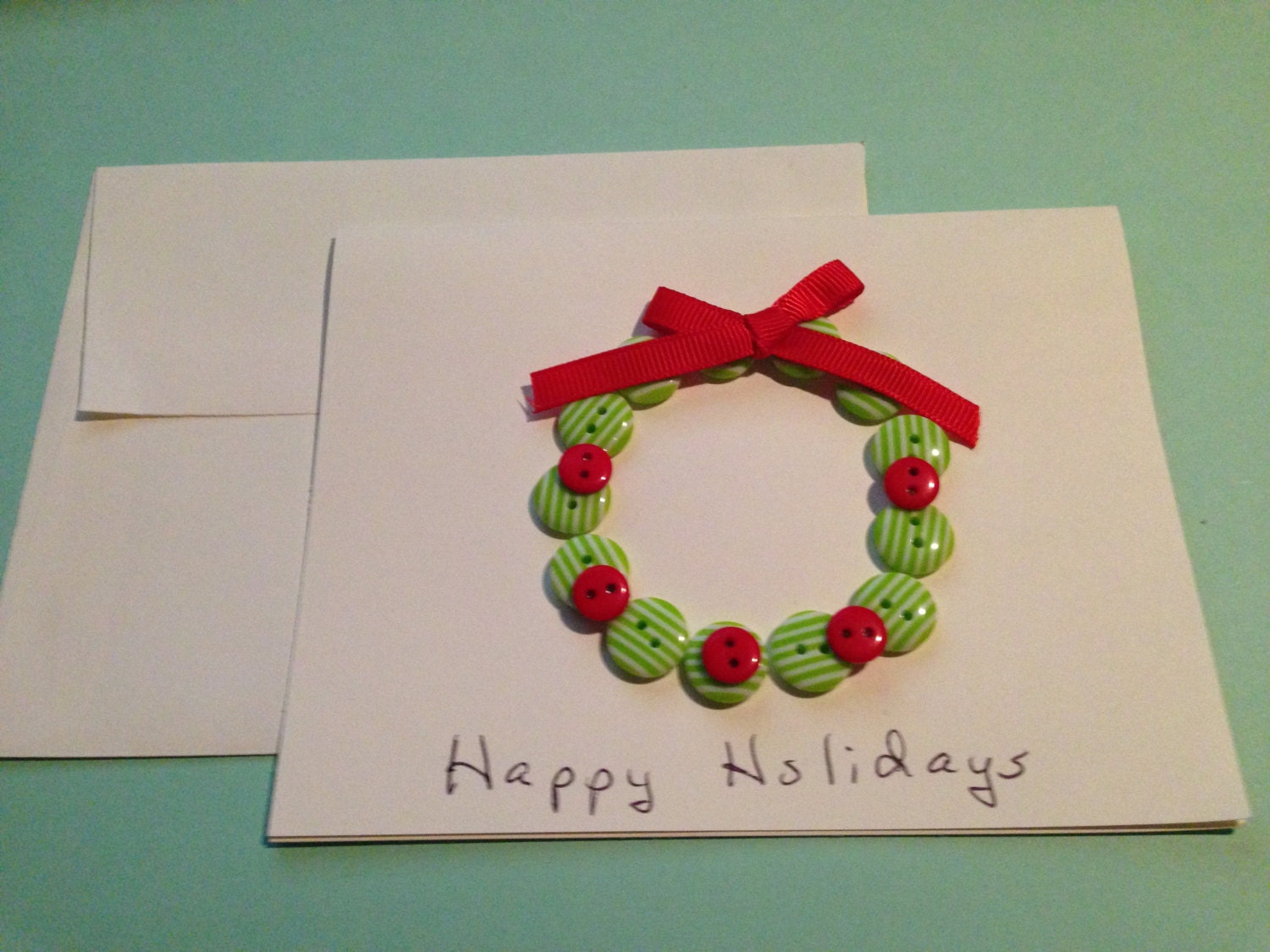 Christmas Card Wreath- made from buttons and ribbon - blank inside so you can add your own message. Cards are 5 1/2 X 4 1/2 in.