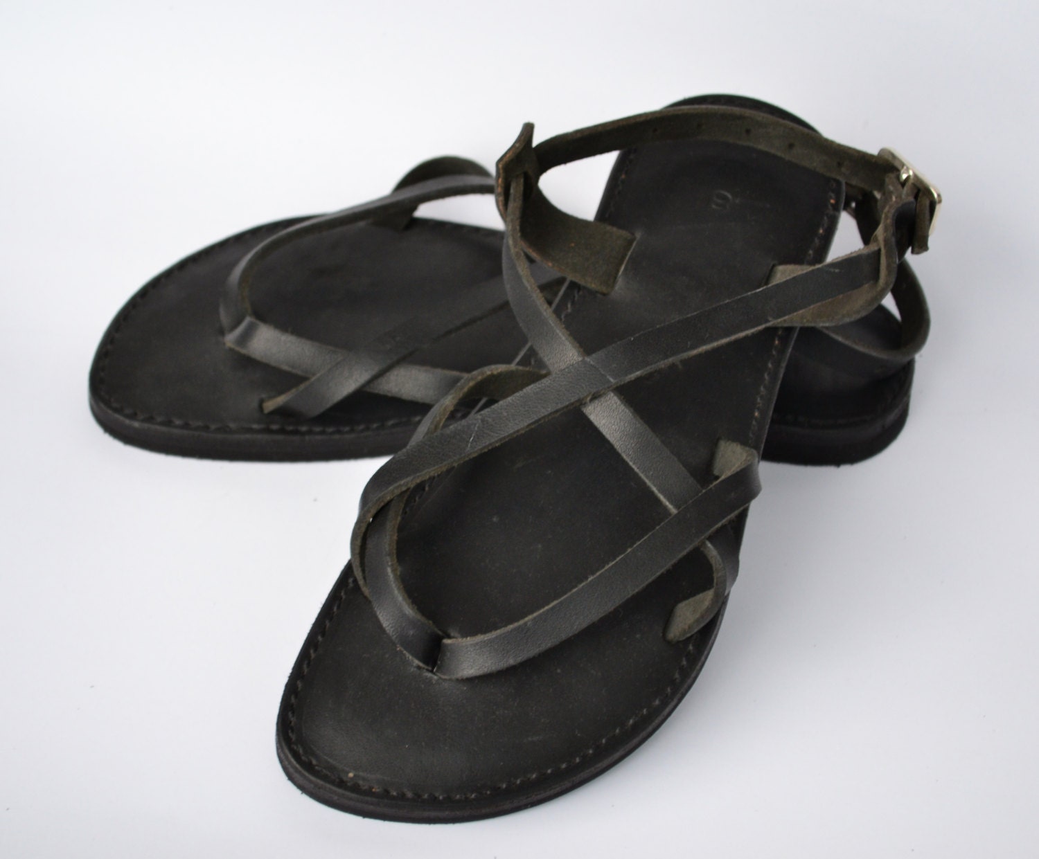 black and brown flat sandals
