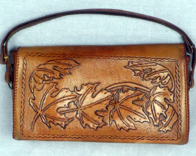 60s southwestern hand-tooled cowhide clutch bag