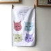 Four slightly different cats towel