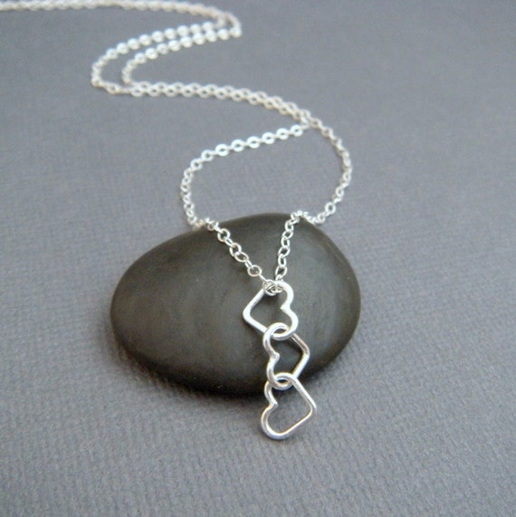 silver heart necklace. tiny dangling hearts. sterling silver