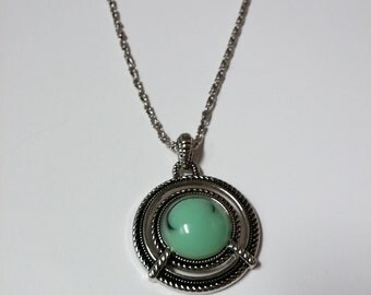 Items similar to Sea Glass Pale Sea Foam Pendant with Filigree Bell Cap