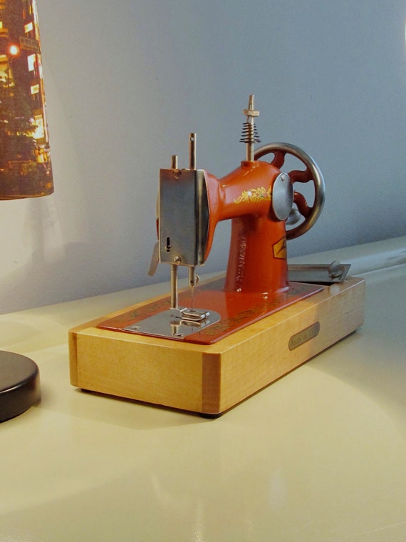 Vintage Toy Sewing Hand Crank Machine with Wood Base Made in