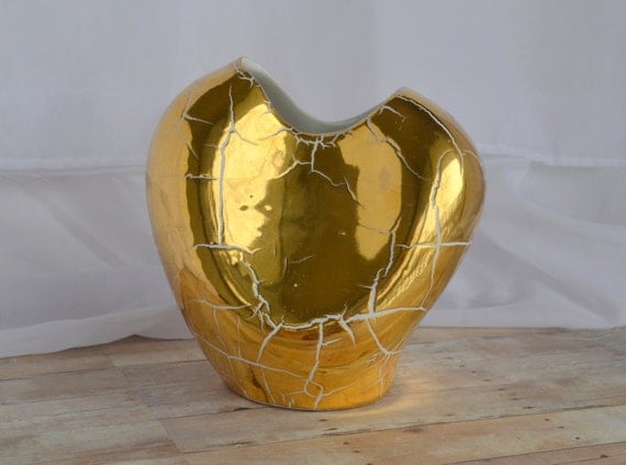 Metallic gold/golden crackled ceramic vase looks a little