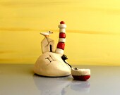 Miniature lighthouse and miniature house , miniature ceramic sculpture / ceramic lighthouse with a beach house and a ceramic bird / handmade