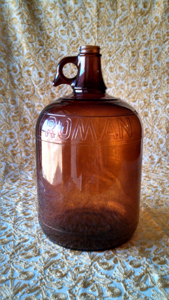 Items similar to Large Brown Glass Roman Cleanser Bleach Jug on Etsy