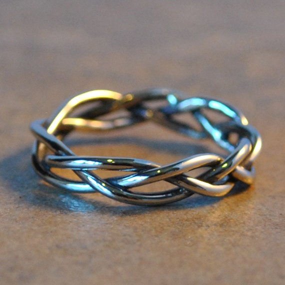 Items similar to maverick ring 14k solid white gold hand braided