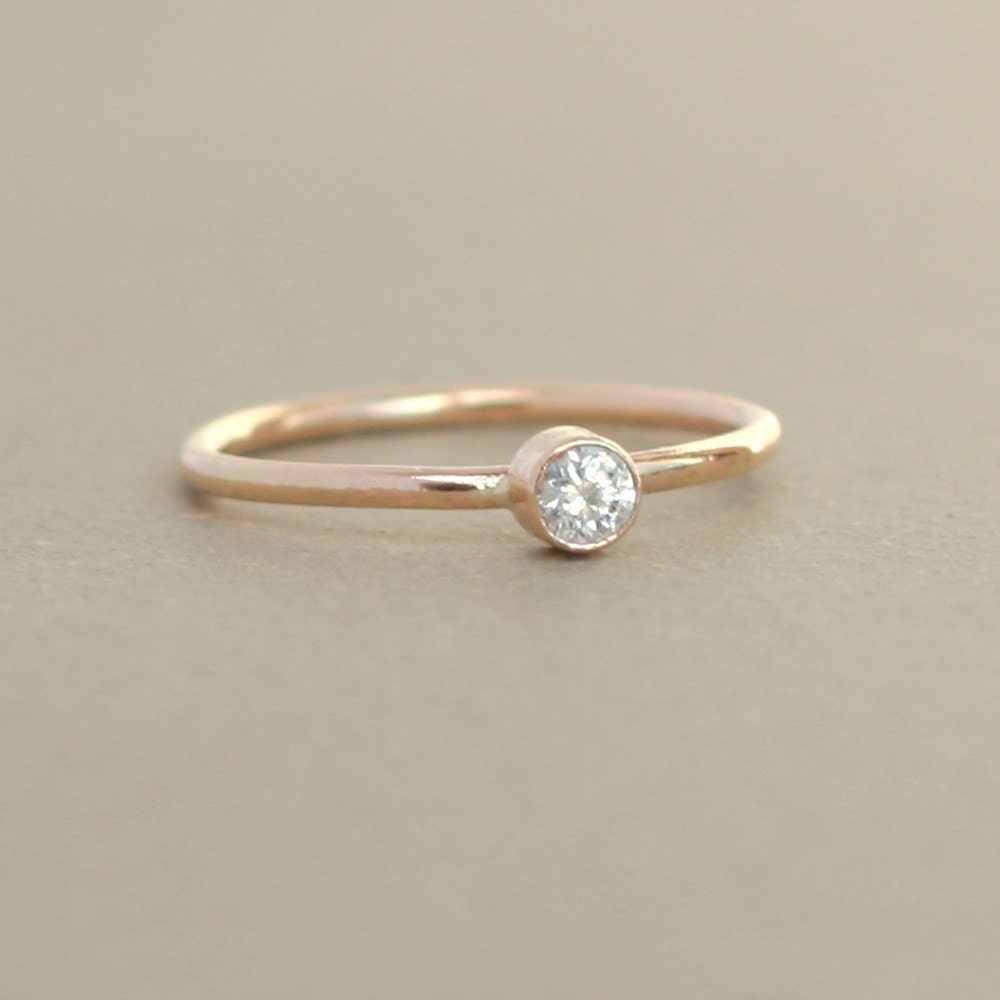 gold ring. diamond. engagement ring. birthstone ring. ONE