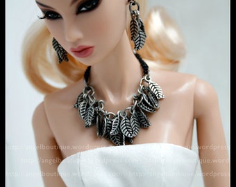 Beautiful Statement Necklace with Mini silver leaves. Set completes with matching earrings.