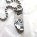 Roll with It . Sterling Silver Ripped Tag Pendant . JaxVox