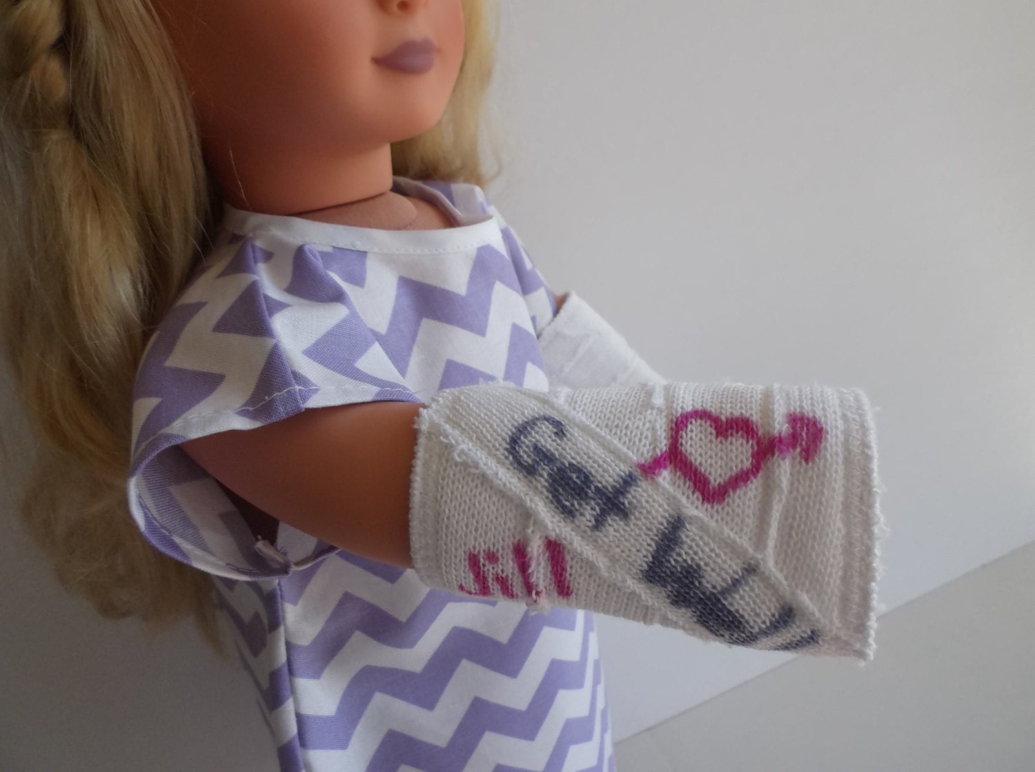 journey girl doll arm broken
