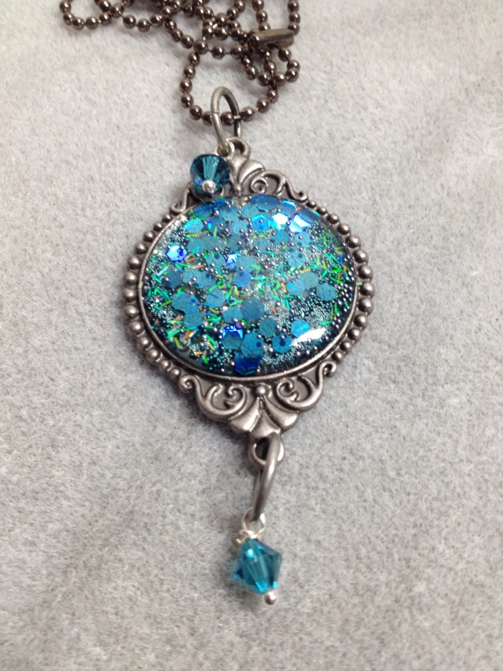 Teal glitter resin pendant