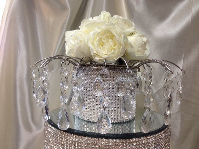 Rose and crystaleffect chandelier style wedding cake topper