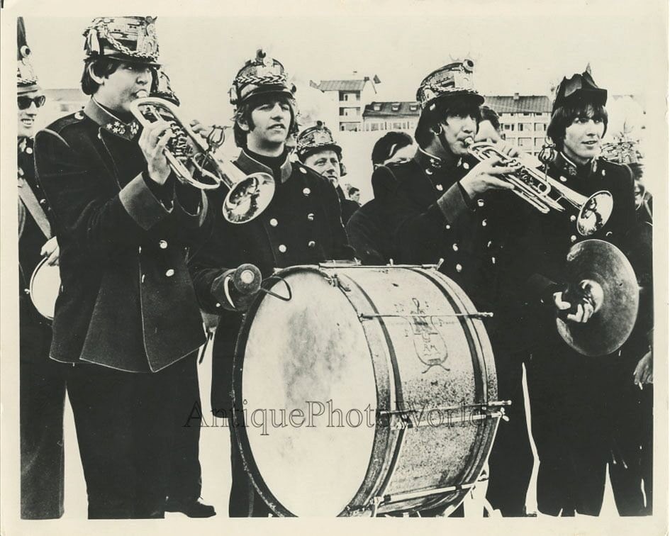 The Beatlesas a marching band with drum trumpets vintage music