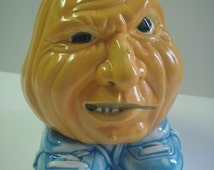 Jack-o-Lantern, Ceramic Pumpkin with blue Tennis Shoes and mean face. - il_214x170.650379232_dabq