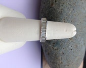 Beautiful Eternity Band With CZ Baguettes Set In Sterling Silver