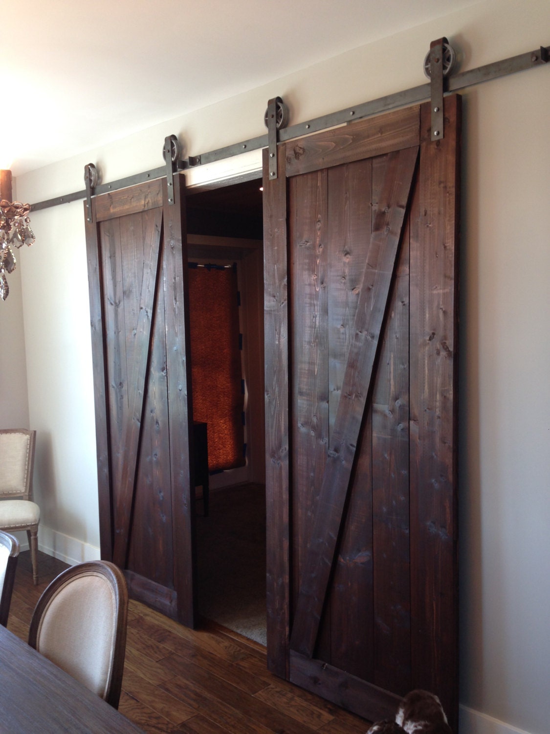 Are barn doors still in style? Interior designers weigh in on the well-loved rustic feature