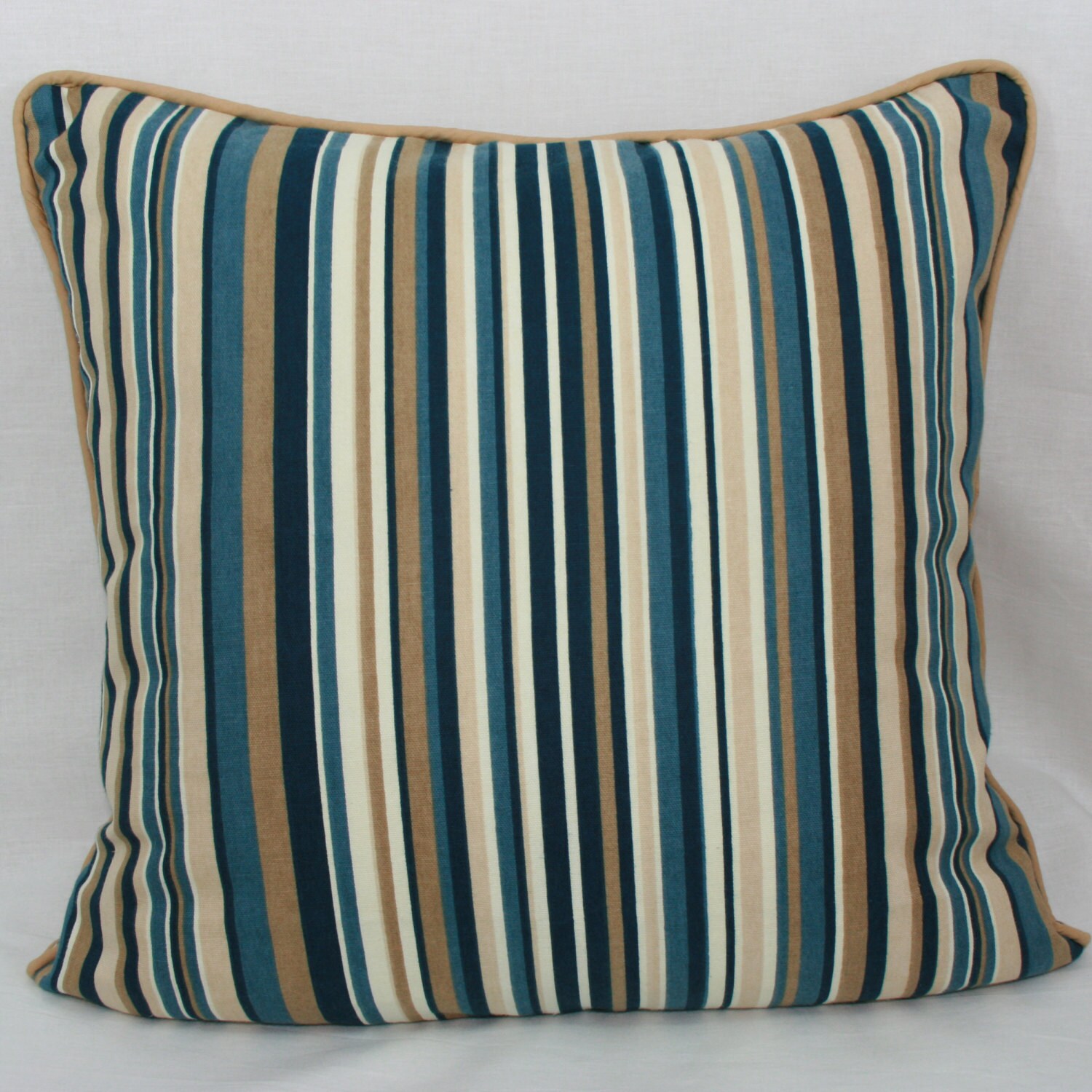 Blue and tan striped decorative throw pillow. 20 by
