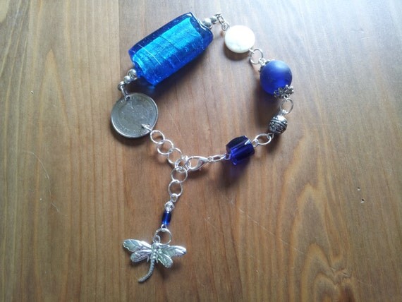 Blue Moon over Canada - Charm bracelet with Canadian Nickle and blue Glass beads - Silver Dragonfly Charm on the Extender Chain