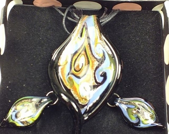 Storewide 25% Off SALE Gorgeous Murano-inpsired necklace and earring set Featuring rich shades swirls on a silver and copper foil backdrop