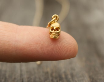 Tiny Gold Dipped Skull Necklace - Halloween Jewelry . Teeny Tiny Matte 24K Gold Dipped Skull Charm . Gold Skull Pendant