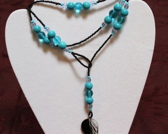Items similar to Seed bead lariat leaf necklace on Etsy