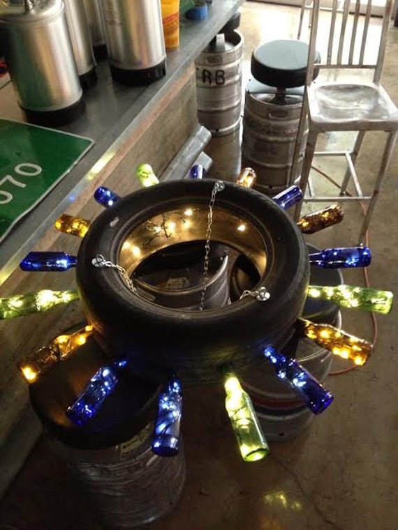 Items similar to Tire & Beer Bottle Chandelier on Etsy