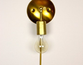 antique brass plug in wall sconce