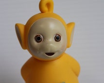 yellow teletubby toy