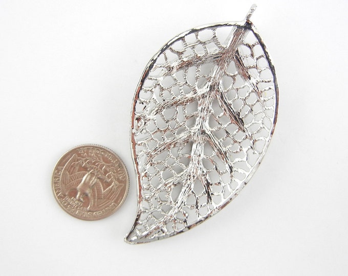 Large Silver-tone Filigree Leaf pendant with Rhinestones