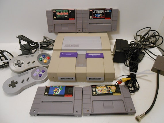 1990s Super Nintendo Entertainment System with Cords Plugs