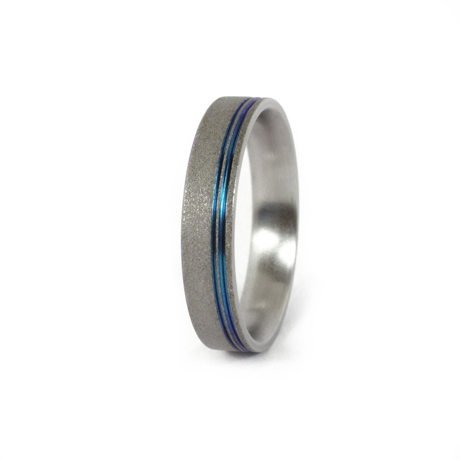 Women's dark sandblasted titanium ring with blue anodized