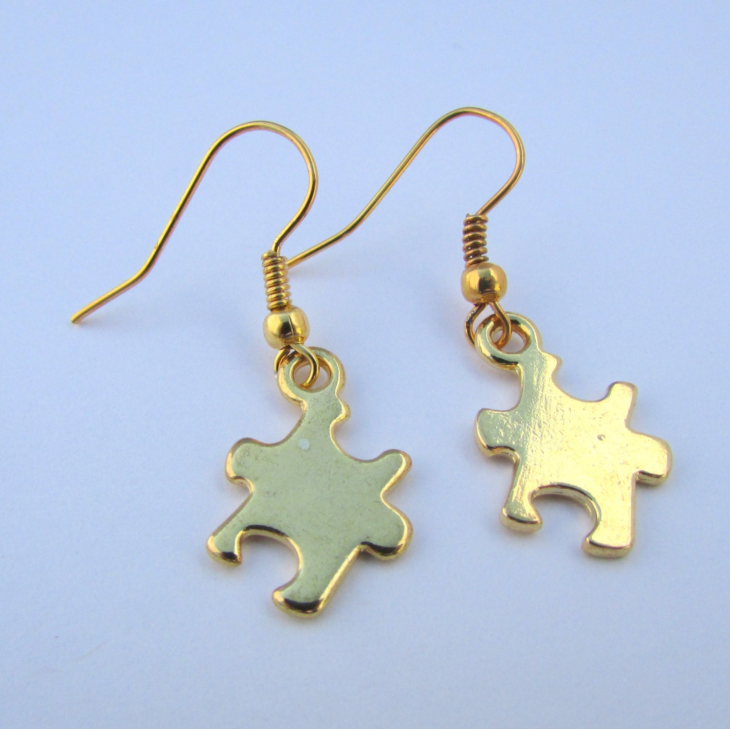 Gold Puzzle Piece Dangle Earrings E51 by bookchics on Etsy