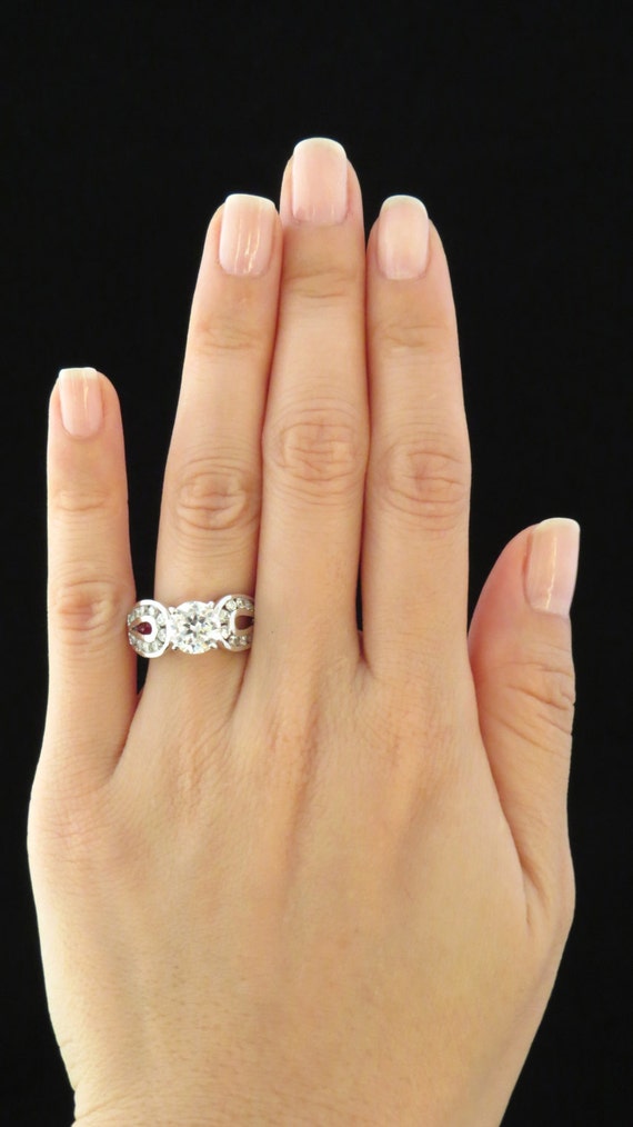 solitare diamond with horseshoe wedding ring