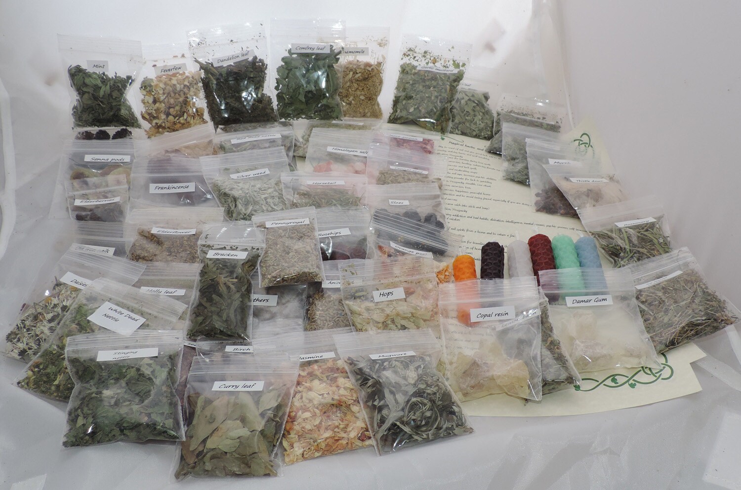 50 herbs resins and ingredients and their uses with 6 candles