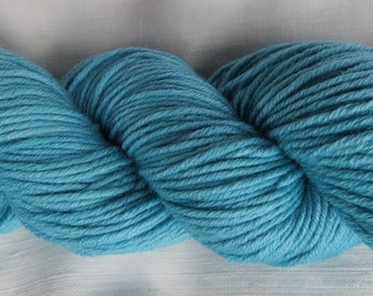 DK, a soft, silky, shiny, pleasure-to-knit-with DK yarn, called shimmering DK
