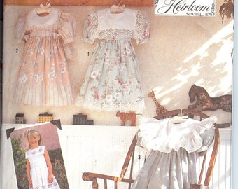 Simplicity 7193 Child's Dresses' with Trim, Collar, and Scallop Variations. ID196