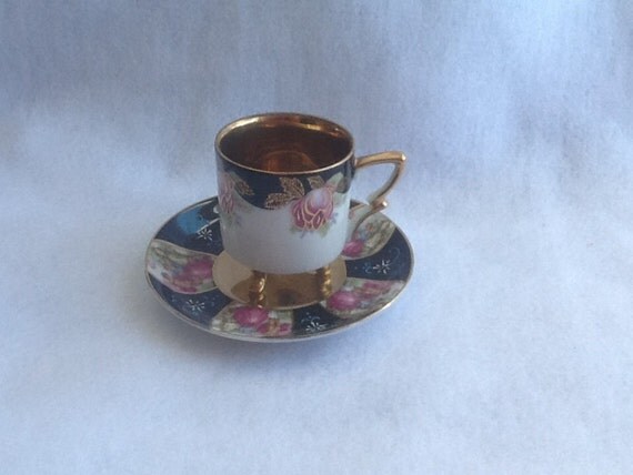 miniature china cups and saucers