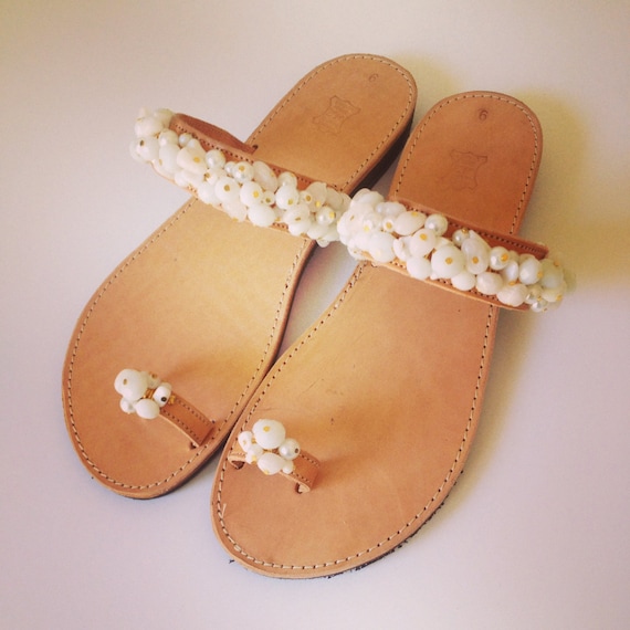 Items similar to White beads handmade leather sandals on Etsy