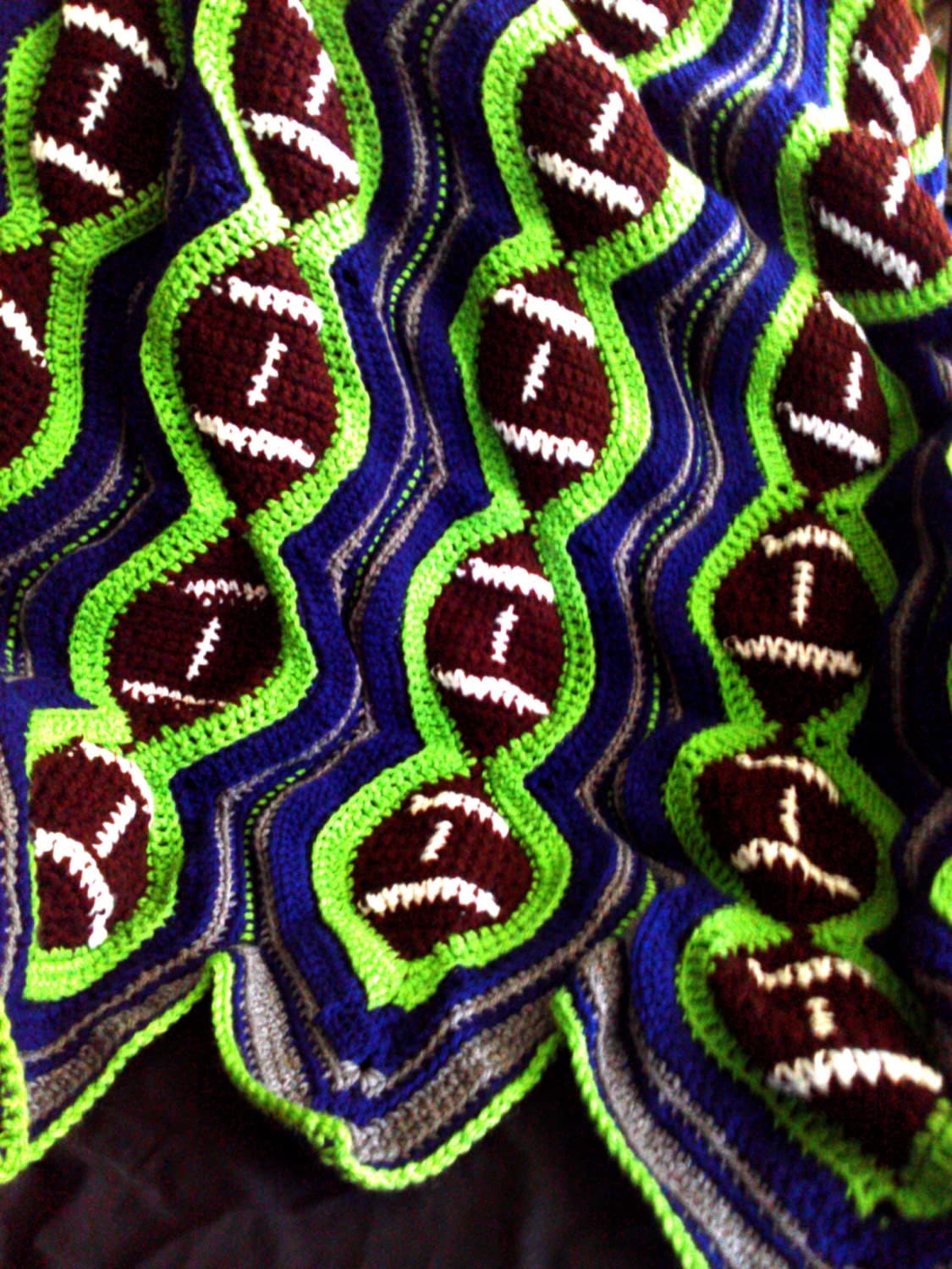 Crochet football blanket in Seattle SeaHawks colors by AKAGRAMMA