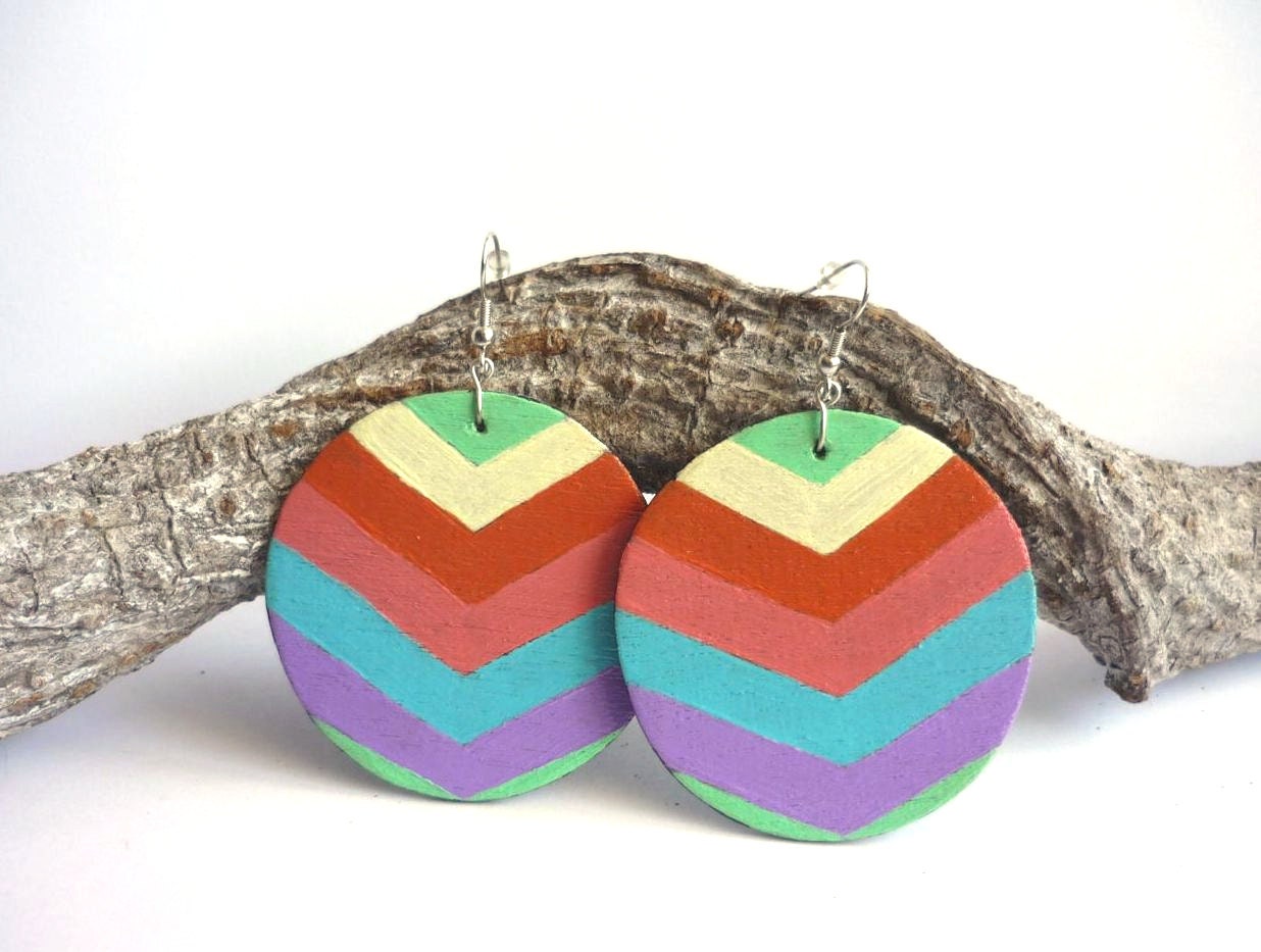 Colorful wooden earrings painted with acrylic paint and