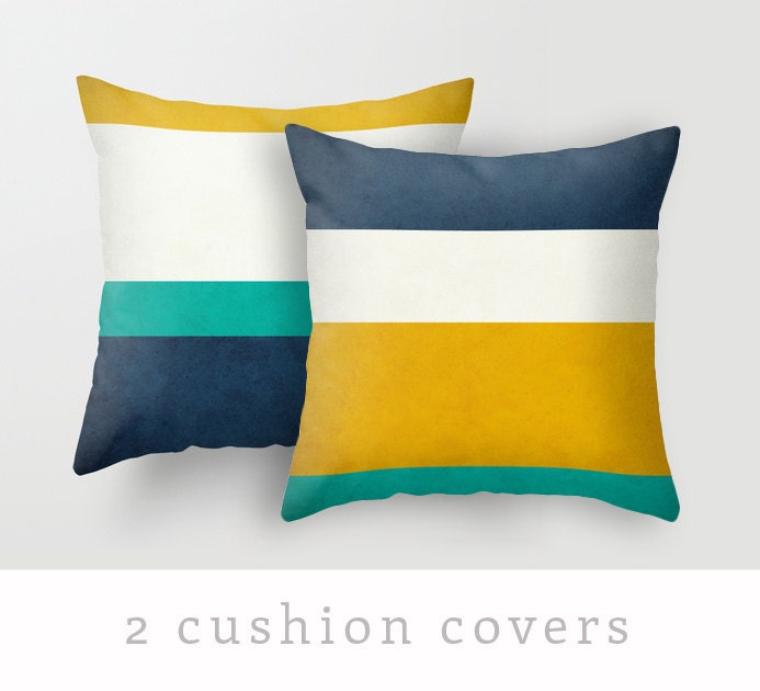 Items similar to 2 Decorative pillows Teal, peach, yellow, blue and